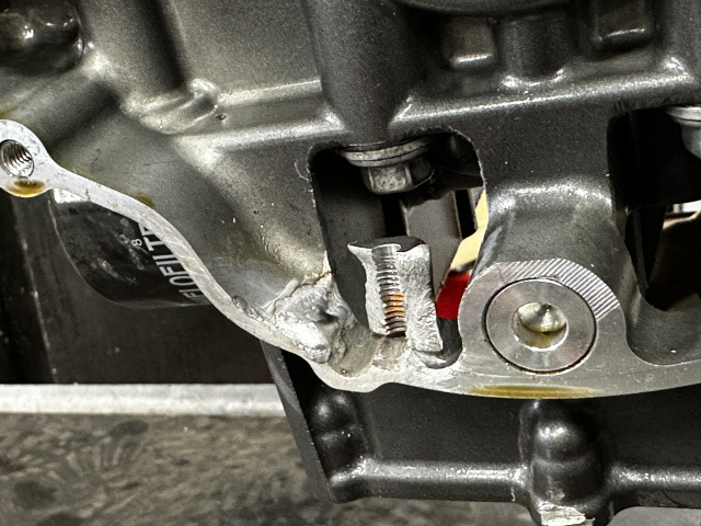 The engine casing on this motorcycle broke on impact in an accident. You can see the piece that broke out. I did not weld the piece back in place but instead built up the area with welding. I then repaired/inserted a thread insert in the casing which turned out perfect.