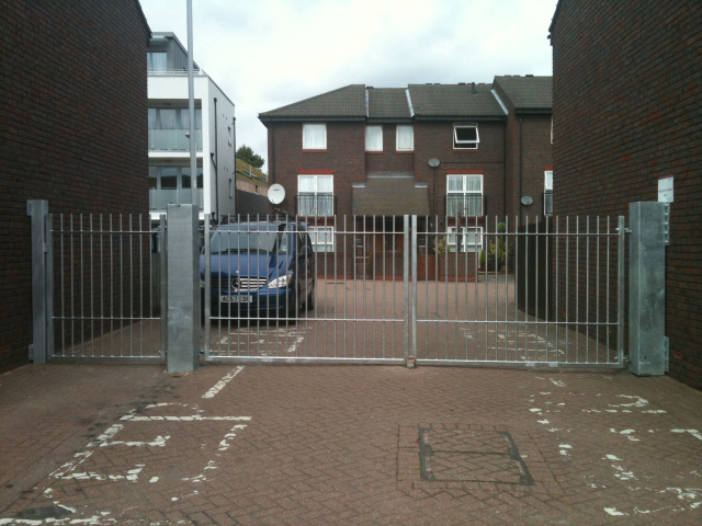 Vehicle and pedestrian galvanized gate fabrication and installation